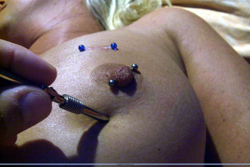 Needle fetish pain for her hot breasts